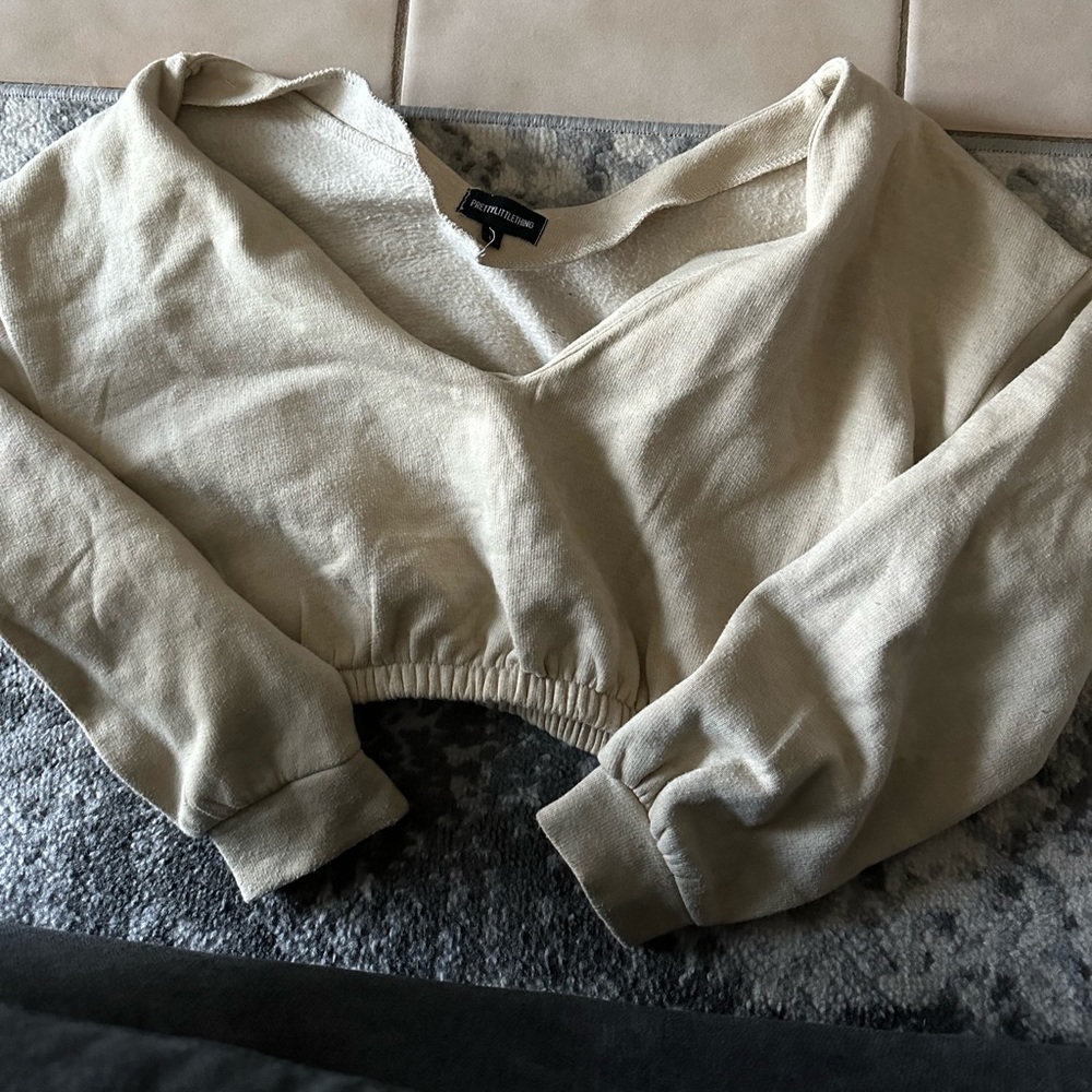 Cropped beige sweater